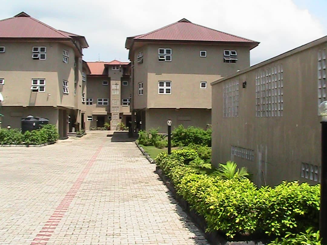Description: This fantastic property within the heart of Oniru Estate shares neighbourhood with Integrity Estate, Es & El Court, 4-Point Hotels by Sheraton, and the City of David Parish of the Redeemed Christian Church of God (RCCG) amongst others. Title: Global Certificate of Occupancy (C of O) with about 80 years unexpired lease Price: N4.5billion Property Features: The property comprises 3 blocks named A, B & C Blocks A & B each comprise 4 Nos of 3-bedroom Flats all rooms ensuite, Guest Restroom, Panasonic Split Unit Air Conditioners in the bedrooms, Living room & Kitchen, Sierra Cooker hood in the Kitchen, 4 units of 1-room studio apartment servant quarters. It also has 2 units of a 1-bedroom flat on the ground floor having complete bathroom sets, cooking alcove, Sierra cooker hood, Panasonic Split Unit Air conditioners in the bedroom and living room. It also has a 1-bedroom Attic flat complete with full bedroom, restroom, kitchen accessories as for the other apartments with split unit air conditioners. Block C comprises 2 Units of 4-bedroom all rooms ensuite semi-detached duplexes on 3 floors, with sitting and dining rooms, a den, guest restroom, Laundry, Panasonic brand split unit air conditioners in the bedrooms, den, dining, laundry and kitchen, Sierra brand cooker hood in the kitchen, a large one room domestic help quarters, 2 units of large attic rooms with restroom, wet bar and Panasonic split unit Air conditioners. The Estate has the under listed additional features: (1) a swimming pool + outdoor shower, equipped with a Gymnasium, and split unit air conditioners. (2) One-storey gate house with restroom facilities, a studio apartment for maintenance service personnel, a 320kva dedicated Electric Power Transformer. (3) 17 units of Electricity Prepaid meters (one for each apartment and common service areas) (4) A 250kva and 300kva Perkins brand electric power generators (5) 1 No 3,000 litre diesel storage tank (6) 2 Nos functional water boreholes (7) 3 Nos of 3,000, 4,000 and 10,000 litres underground water tanks (8) 1 No of a 9,000 litres of glass reinforced overhead water tank and Eco water treatment plant